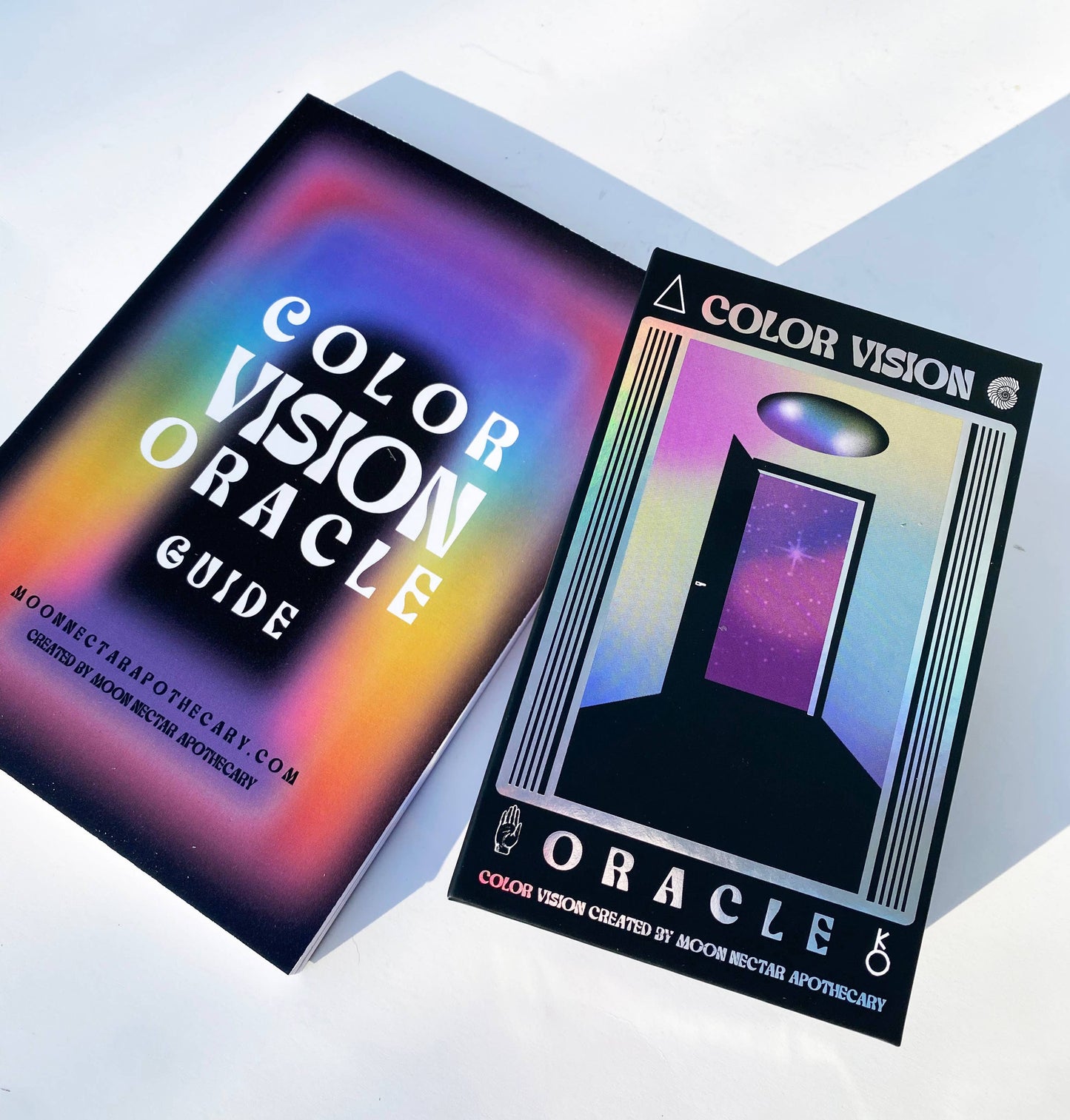 Color Vision Oracle guidebook and cards on a white background