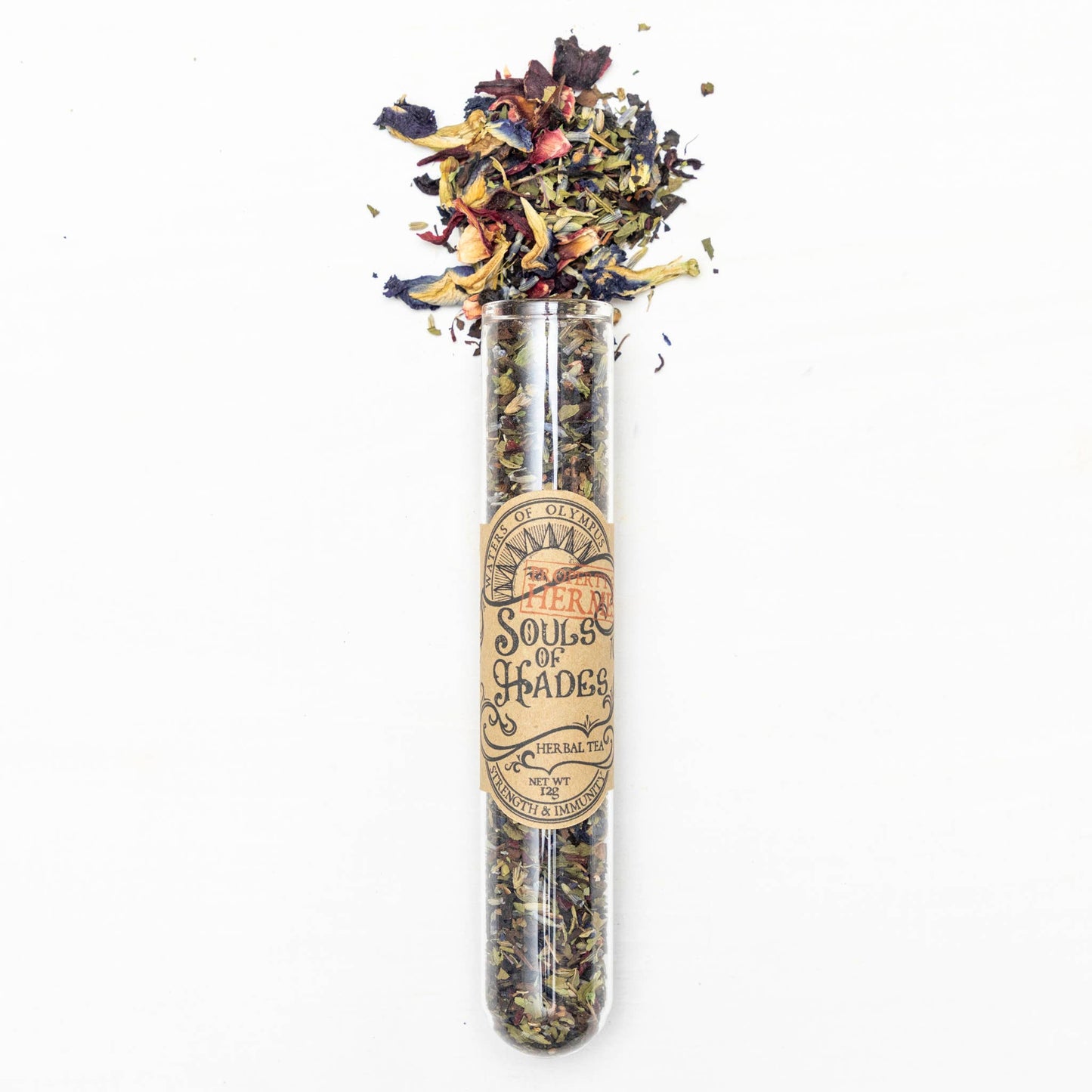 Herbal tea in a glass tube with a label on a white background