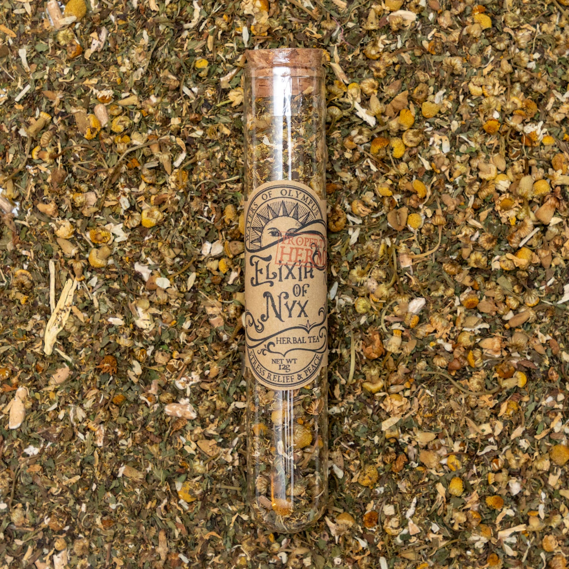 Herbal elixir bottle labeled 'Elixia of Nyx' on a textured background