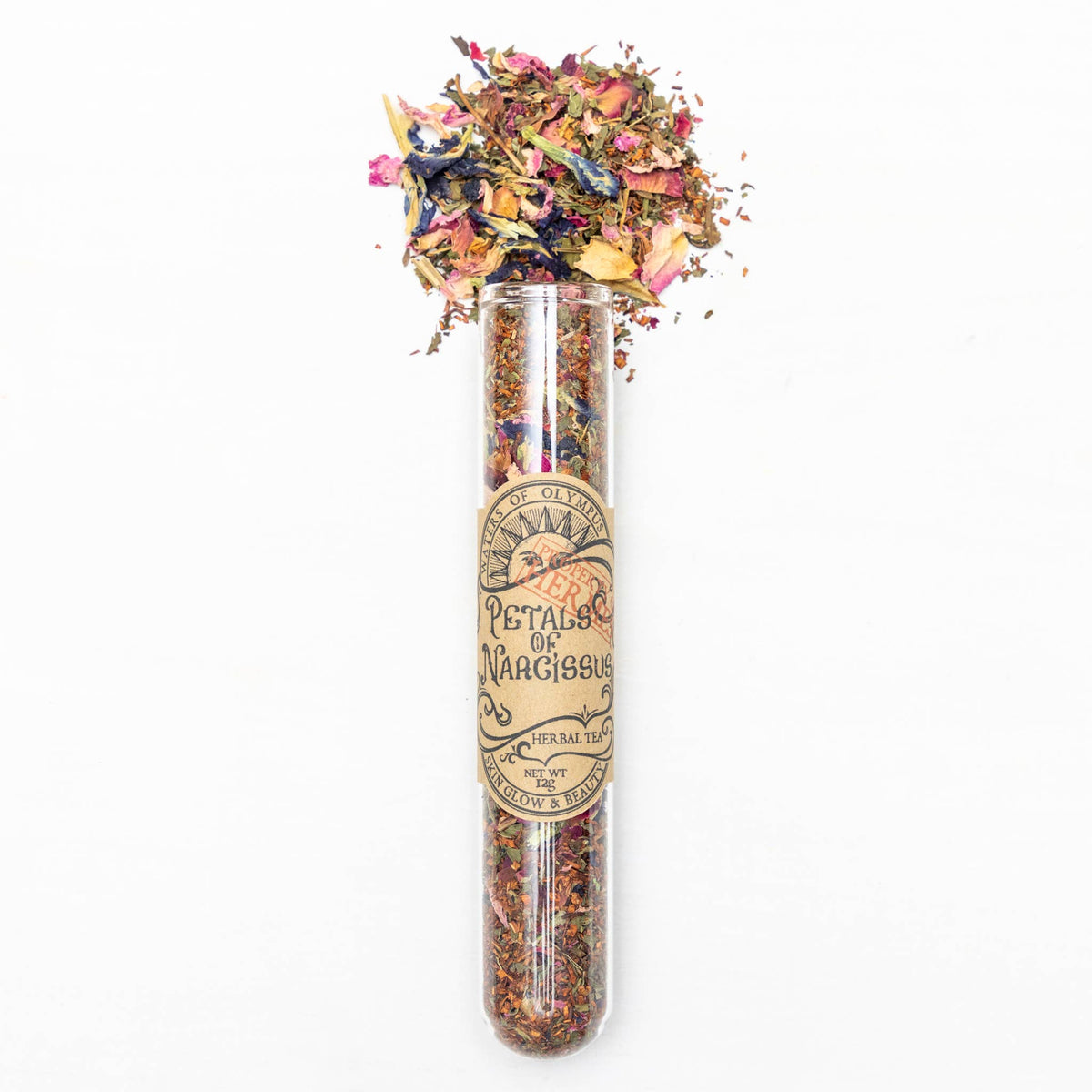 Herbal tea packaging with dried flowers on a white background