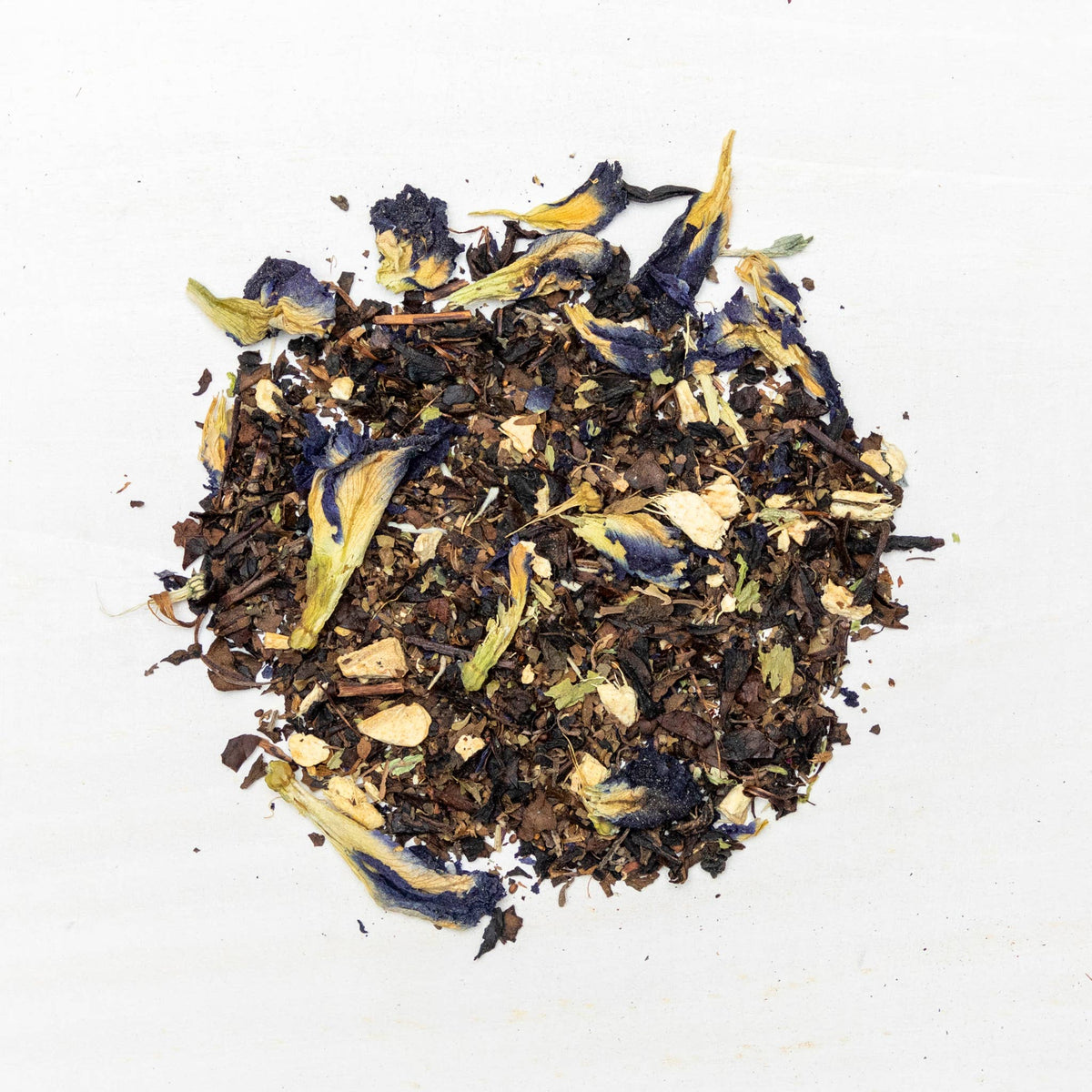 Tea leaves with blue and yellow flowers on a white background
