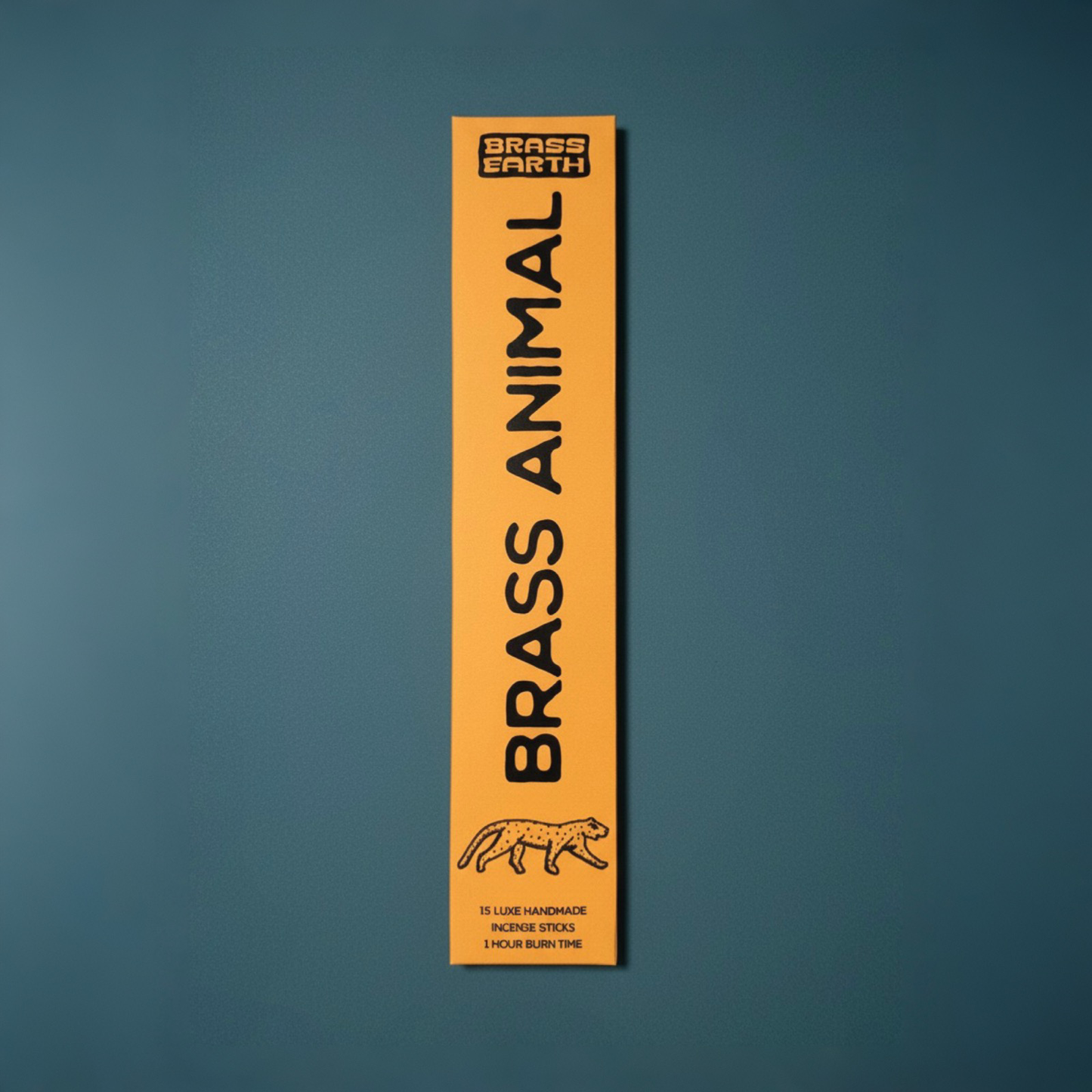 Brass Earth Brass Animal incense stick packaging on a blue background